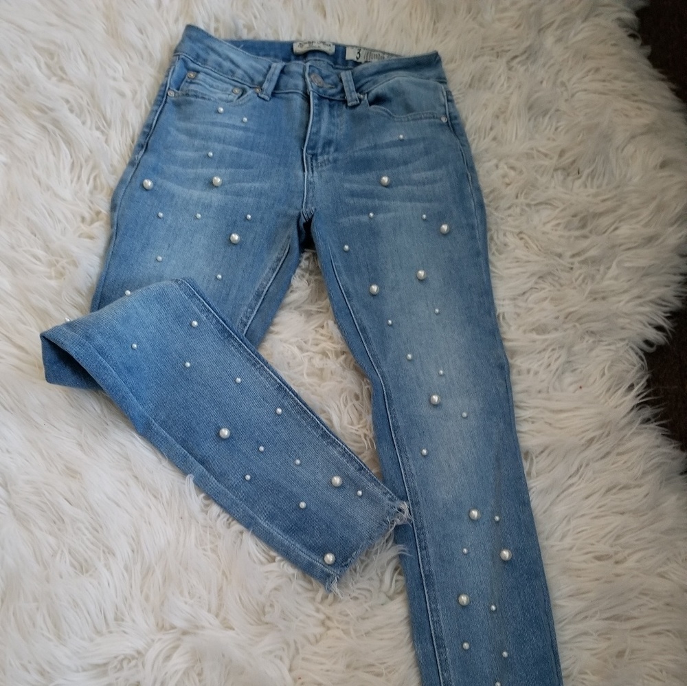 Jeans with pearl  beads.